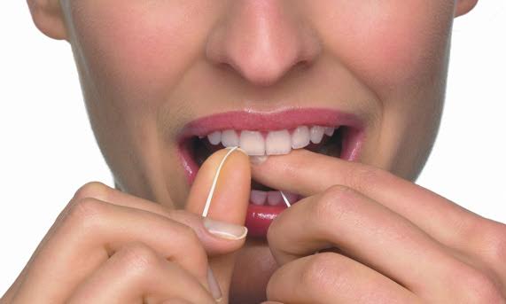 The effects of flossing by the Marshall Dental Clinic Vancouver